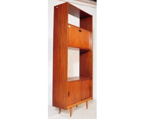 British Modern Design - A mid century teak room divider / wall unit drinks cabinets. Rectangular form with pull down front ca