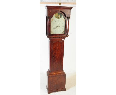 A 19th century oak longcase clock. The clock having an oak case, brass finial to top, and inlaid star detailling. Featuring a