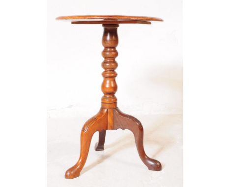 A 19th century Victorian tunbridge inlaid wine table. The table raised on a carved tripod base, under a turned central column