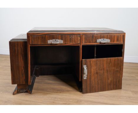 AN ART DECO ROSEWOOD WRITING DESK140cm wide; 78cm high; 69cm deepCondition Report: Some moulding missing, multiple old marks 