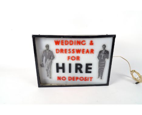A 20TH CENTURY METAL SHOP LIGHT BOX SIGN‘WEDDING &amp; DRESSWEAR FOR HIRE”, 36cm wide; 26cm high