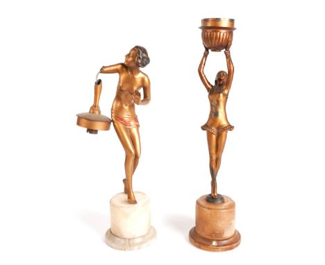 AN ART DECO STYLE GILT-METAL FIGURAL TABLE LAMP MODELLED AS A DANCER (2)Mounted on an onyx plinth, 49cm high; together with a