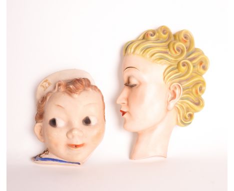 A GOEBEL WALL MASK BY AGNES RICHARDSON AND ANOTHER (2)Stamped to the reverse ‘Specially Designed by Miss Agnes Richardson’, 2