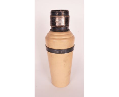 THE MASTER INCOLOUR COCKTAIL SHAKERCirca 1930The cream urea formaldehyde body with chrome mount and cover, the collar rotatin