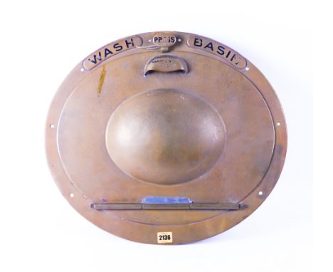 JAMES BERESFORD &amp; SONS BIRMINGHAM, AN EARLY 20TH CENTURY BRASS WALL MOUNTED FOLD OUT WASH BASIN53cm wide; 46cm high
