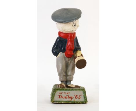 DUNLOP, A MID 20TH CENTURY ADVERTISING FIGURE MODELLED AS A MAN WITH A GOLF BALL HEAD, “WE PLAY DUNLOP 65”12cm wide; 32cm hig