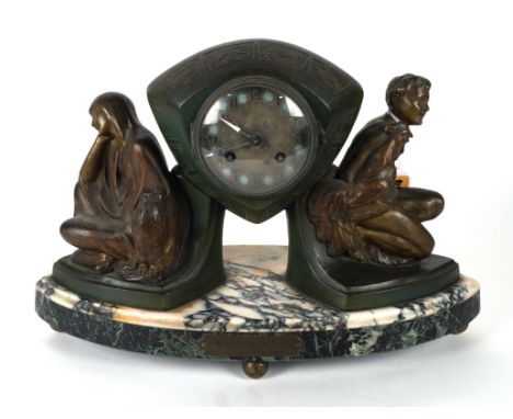 AN ART DECO SPELTER MANTEL CLOCK TITLED DAY AND NIGHT BY P. SEGAThe case modelled with personifications of day and night, zod