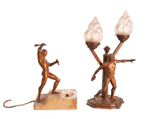 AN ART DECO GILT-METAL FIGURAL TABLE LAMP MODELLED AS OF A MALE ATHLETIC STONE BREAKER (2)Mounted on a roughly hewn onyx base