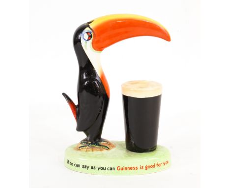 CARLTONWARE: A GUINNESS LAMP BASE FORMED AS A TOUCAN19cm wide; 24cm high