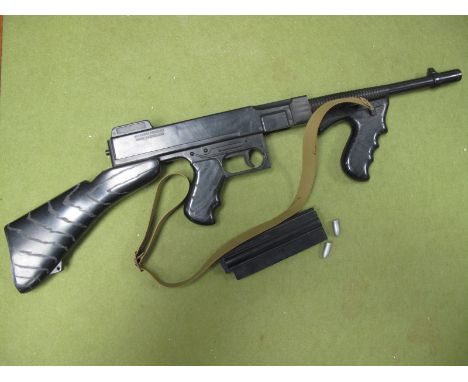 A Plastic Airfix Machine Gun, possibly a F.A. L, with magazine and ammunition rounds.