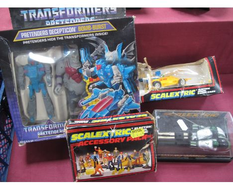 A Boxed 'Transformers' Pretenders Decepticon Bomb Burst, toy appear unused, box has some crushing, along with Scalextric C282