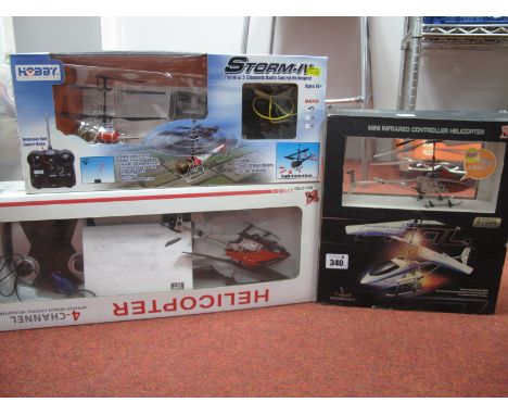 Three R.C Helicopters - to include Heng Long Infrared Helicopter, Hobby Engine Storm _IV and a four channel Helicopter.
