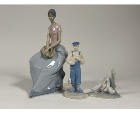 A collection of figures comprising, a Lladro "Quite moment" figure (loss of fingers) (h-34cm), a Nao three geese figure and a