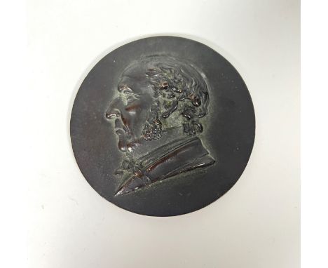 A 19th century cast brass portrait medallion (d. 9.5) 