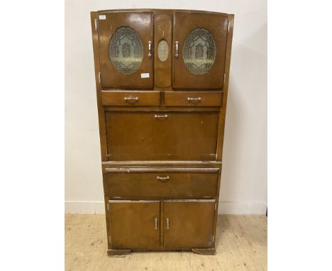 Vintage Welmayd kitchen cabinet with a pair of part glazed doors flanking a pierced metal air flow, above two drawers with a 