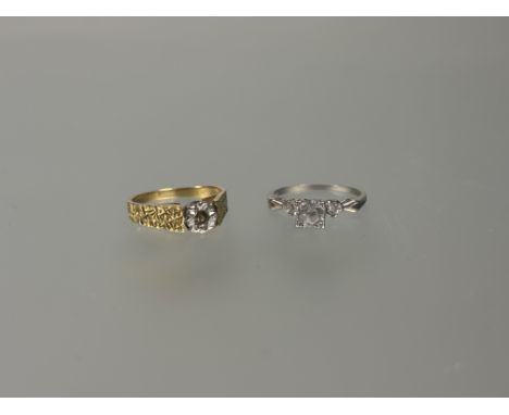 A 18ct gold and white metal mounted ring missing stone N 3.52g and 10ct white cold mounted ring set central clear stone N 1.6
