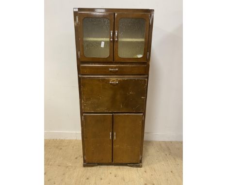 Vintage kitchen cabinet with a pair of glazed cupboard doors above a single drawer and fall flap, with a pair of cupboard doo
