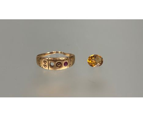 An Edwardian gold ring set two ruby points center stone missing cut and a loose oval faceted citrine approximately 0.5ct 1.78