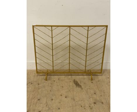 Metal gold painted fire guard, standing on squat supports, 79.5cm x 98cm 
