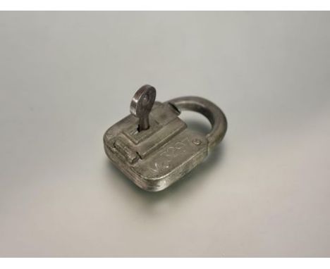 A vintage Customs &amp; Excise paper seal padlock, numbered M3297 to the padlock and key, Customs &amp; Excise crowned mark t