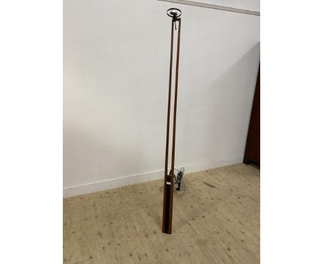 Retailed by Liberty London a wall mounted spot light with a metal bracket and arm, with a mahogany and birch column with an a