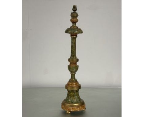 An 18thc treen alter candlestick converted to lamp of turned baluster form with green and ochre marbled painted and gilded fi