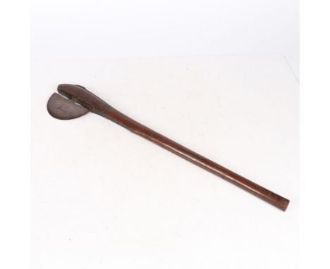 second third of the 20th century, having a iron half moon axe head on a wooden shaft, 63cm long.