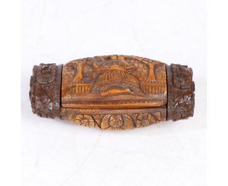 The hinged lid carved with a lady playing the harp in a walled garden, the opposing side with a profile figure among horns, 7