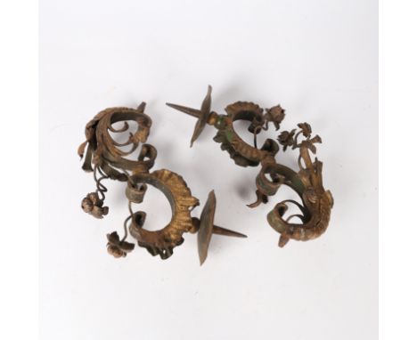 having a floral gilt metal scroll design with a pricket candlestick, 23cm wide.