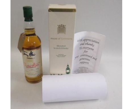 A bottle of House of Commons Blended Scotch Whisky, bottled by Gordon &amp; Macphail and signed by Tony Blair and Dennis Skin