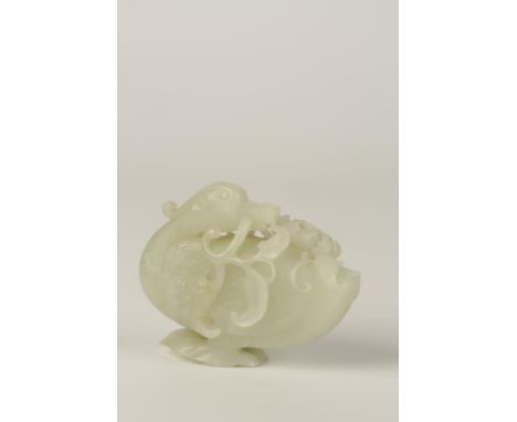 A CHINESE PEARL CELADON JADE FIGURE OF A DUCK holding a flowering branch across its' back, with stylised plumage, the stone w