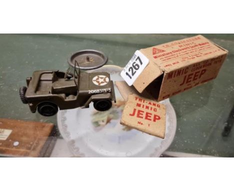 A Minic clock work jeep no 1 in original box 