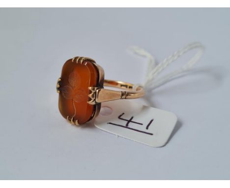 A carved cornelian ring - size Q 