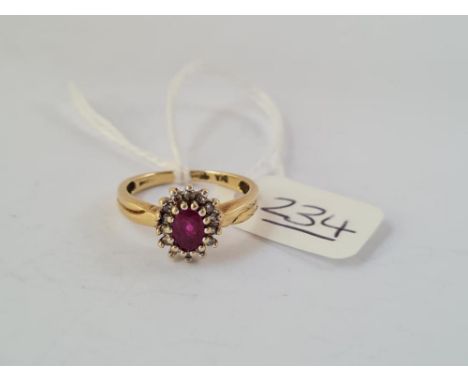 A ruby &amp; diamond cluster ring in 9ct - size L - 2.5gms
