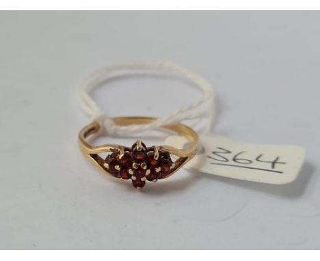 A garnet cluster ring in 9ct - size Q - 2.1gms