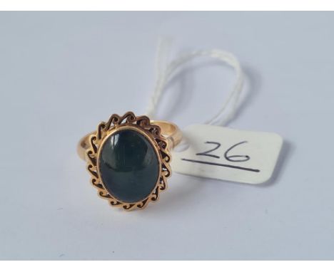 A star sapphire ring in 14ct gold - size O - 4gms