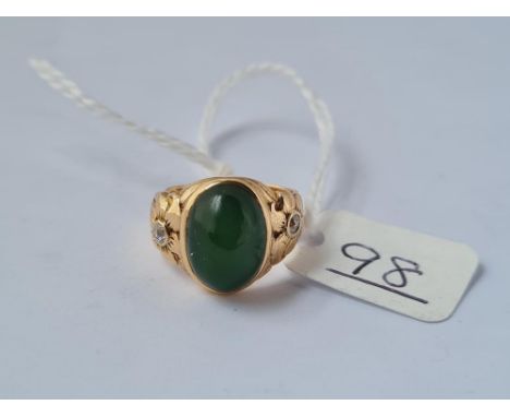 A jade &amp; diamond ring in 14ct gold - size H - 6.1gms