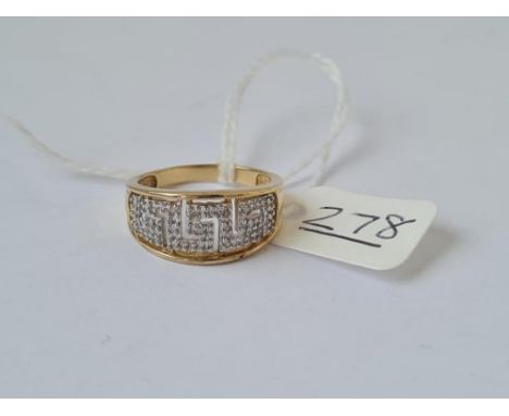 A multi stone diamond ring in 9ct - full hallmarks - marked DIA - size N - 3.2gms