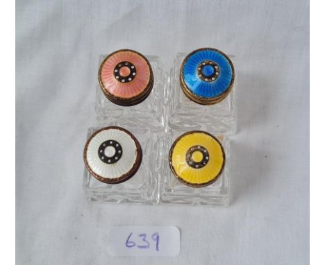 A set of 4 Norwegian 925 standard enamel top peppers with glass body's 1 3/4 inches high 