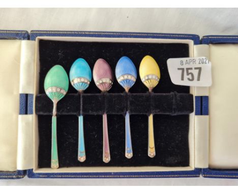 Five Enamel decorated coffee spoons in fitted box 