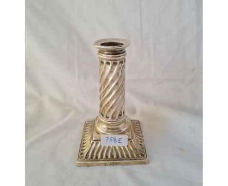 A Victorian square base candle stick with fluted decoration 5 inches high London 1885 by Martin hall 