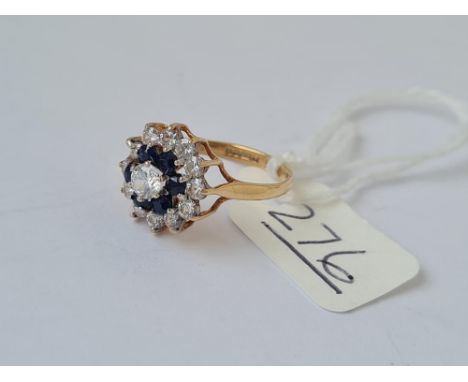 A dress ring with white &amp; blue multi stones  in 9ct - full hallmarks - sixe K - 2.1gms