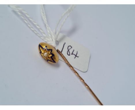 An enamel &amp; pearl stick pin set in gold - 1.8gms