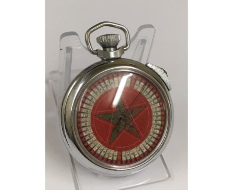 A vintage gaming pocket watch (when wound the mechanical arm spins round landing randomly on a different marker each time