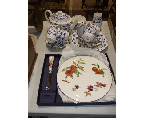 A twenty-two piece Spode 'Blue Colonel' tea set, a Royal Worcester 'Arden' decorated ceramic circular cheese board and knife,