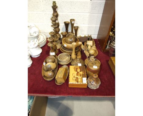 A collection of olive wood objects, including table lamp, candlestick, bowls, vases etc.