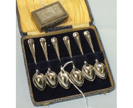 A cased set of six silver coffee spoons, London 1932 and a white metal rectangular snuff box with engraved decoration, the li