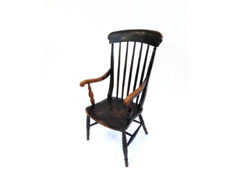 A COMB BACK WINDSOR ARMCHAIR  on H-shape stretcher base, the elm seat 48cm wide 44cm deep, 109cm high overall