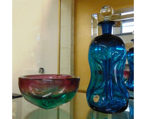 A HOLMEGAARD BLUE GLASS 'GLUG-GLUG' DECANTER  with original paper label, 23.5cm high; and a coloured glass bowl (2)