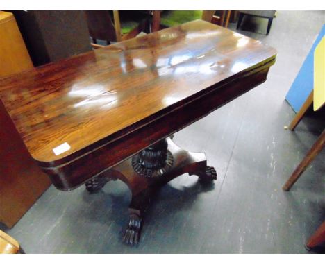 A VICTORIAN ROSEWOOD 'D' SHAPED FOLD OVER CARD TABLE the turned and carved pedestal on an incurving platform base raised on f